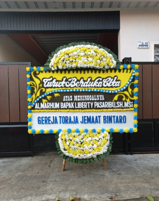 Papan Bunga Duka di Tuguiha